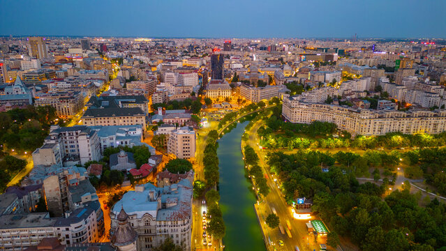 Sunset panorama view of Dambovita river passing the old town of Bucharest, Romania