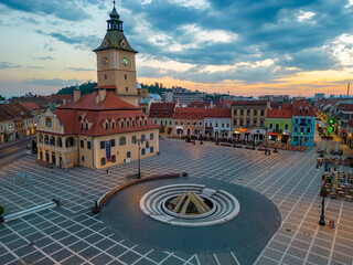 Sunrise view of town hall at the The Council's Square in Brasov, Romania - obrazy, fototapety, plakaty