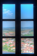 Fototapeta premium Panorama view of Romanian town Rupea thorugh window of the citadel