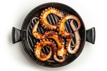 An overhead shot displaying a whole octopus with tentacles stretched out, cooked to a perfect golden brown, sizzling in a black frying pan on white background. 