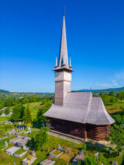 Fototapeta na wymiar Wooden Church St. Archangels in the village Plopis in Romania