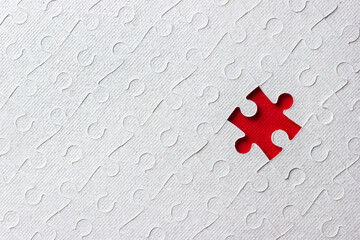 One missing piece in diagonal puzzle on red background. Сoncept of finding business solution....