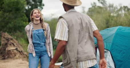 Camping, adventure and couple at tent with high five, smile and relax in nature together with teamwork. Celebration, cooperation and man with happy woman at campsite, trees and outdoor holiday fun.