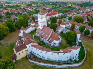 Sunset view of the Fortified Evangelical Church in Harman, Romania
