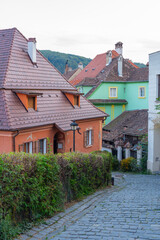 Colourful street in the old town of Sighisoara, Romania