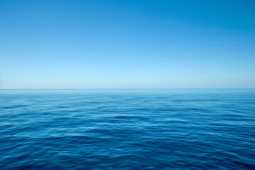 Calm sea and blue infinity, far horizon between blue sky and blue ocean water and copy space