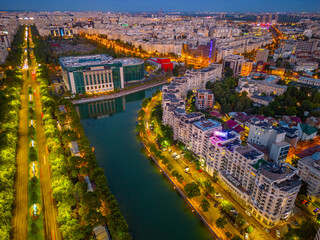 Sunset panorama view of Dambovita river passing the old town of Bucharest, Romania