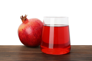 Refreshing pomegranate juice in glass and fruit on wooden table against white background