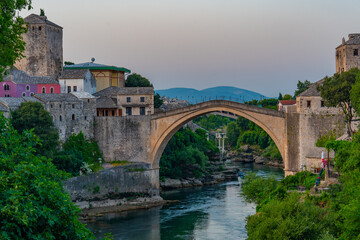 Fototapeta na wymiar Sunrise view of the old Mostar bridge in Bosnia and Herzegovina