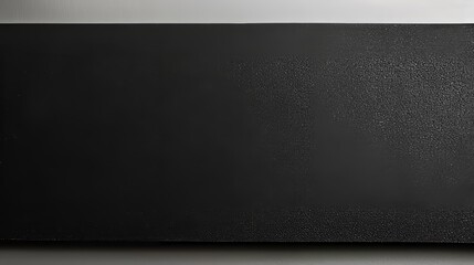 Plain black textured background for design use
