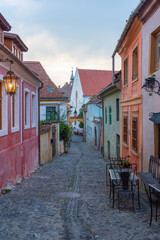 Colourful street in the old town of Sighisoara, Romania