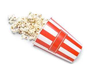 Gordijnen Bucket with tasty popcorn on white background © Pixel-Shot