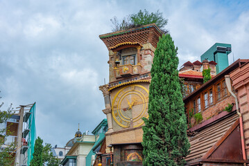 Famous clock tower in Georgian capital Tbilisi - obrazy, fototapety, plakaty