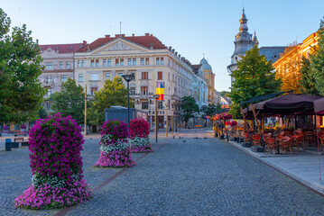 Sunset view of Piata Unirii square in the old town of Cluj-Napoca, Romania