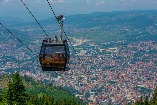 Trebevic gondola raising from the old town of Sarajevo, Bosnia and Herzegovina