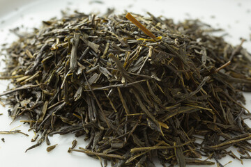 A closeup view of a pile of loose leaf gyokuro green tea.