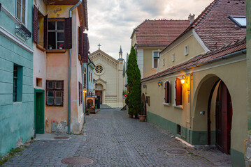 Colourful street in the old town of Sighisoara, Romania