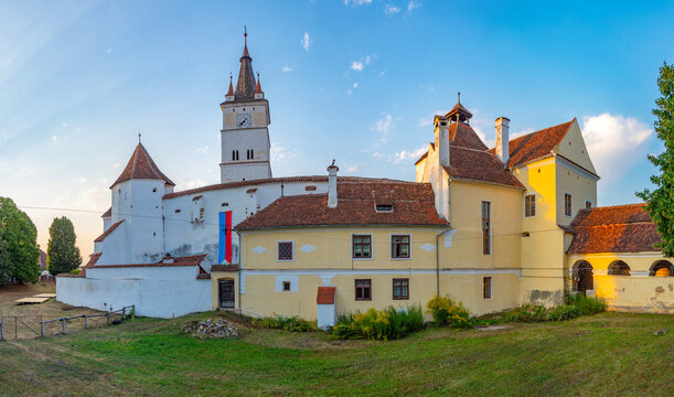 Sunset view of the Fortified Evangelical Church in Harman, Romania
