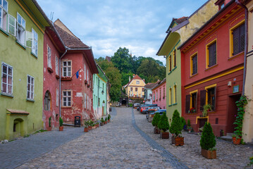 Colourful street in the old town of Sighisoara, Romania