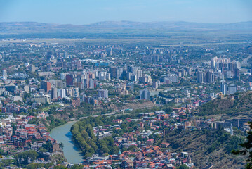 Kura river and colourful balconies of historical houses in Tbilisi, Georgia © dudlajzov
