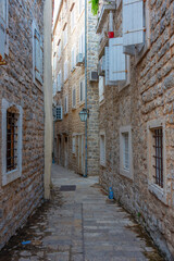 Fototapeta na wymiar Narrow street in the old town of Budva, Montenegro