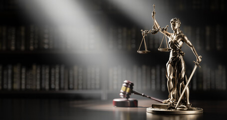 Legal Concept: Themis is the goddess of justice and the judge's gavel hammer as a symbol of law and order on the background of books - 779315012