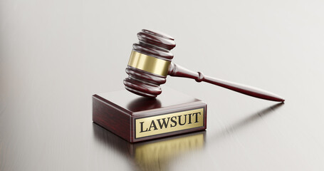Lawsuit: Judge's Gavel as a symbol of legal system and wooden stand with text word - 779320423