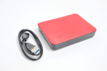 External Hdd drives 2.5 and 3.5 inch and flash drives on white isolated background. Selective focus.