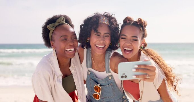 Friends, women and selfie video by the ocean with travel, fun outdoor and happy for social media post. Memory, photography and influencer live streaming, playful and smile in picture on beach holiday