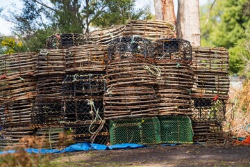 crayfish cray pots stacked up in tasmania australia