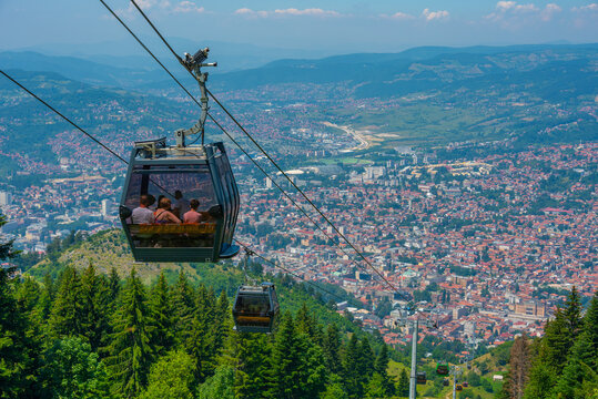 Trebevic gondola raising from the old town of Sarajevo, Bosnia and Herzegovina