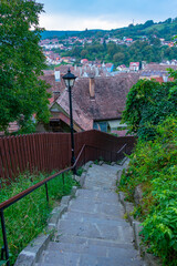 Colourful street in the old town of Sighisoara, Romania