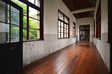 Taiwan - Jan 24, 2024: The wooden floor corridors of Songshan Cultural and Creative Park integrate...