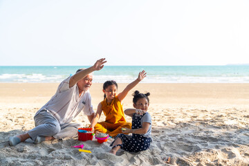 Happy Asian Multi-Generation family enjoy and fun outdoor lifestyle travel ocean on summer beach...