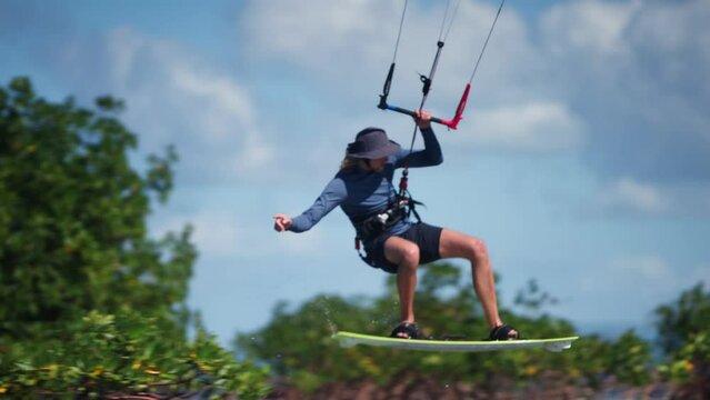 Kiteboarder Navigating Mangroves Skillfully and Performing Tricks, Close Up, Slow Motion,  Dominican Republic