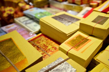 Taiwan - Jan 18, 2024: Hell money, also called spirit money, is paper burned as an offering to ancestors in Chinese worship. It's believed to provide them with what they need in the afterlife.