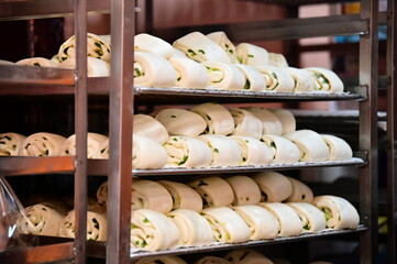 Steamed scallion  bun (Hua Juan) is a popular steamed bun in Taiwan filled with scallions. It is a...