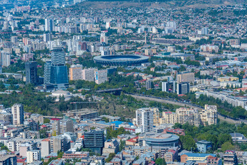 Residential neighborhood of Tbilisi with a football arena, Georgia - obrazy, fototapety, plakaty