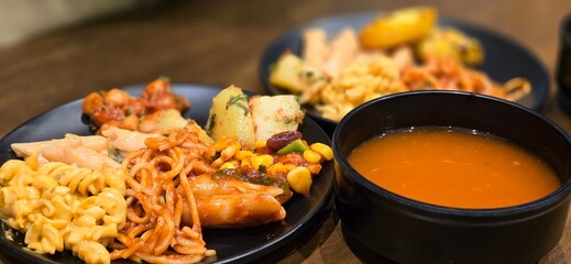 Close up shot of Restaurant food with soup bowl. Noodles and pasta dish with soup in restaurant. 