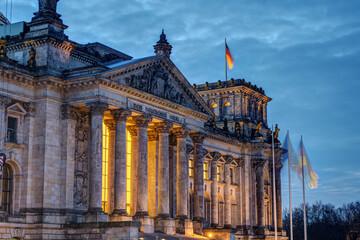 The entrance portal of the Reichstag in Berlin at twilight
