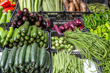 Pickles, zucchini and different kinds of peas for sale at a market in Naples, Italy - 779366691