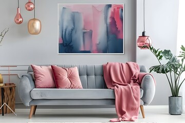 A pink couch sitting on top of a wooden floor
