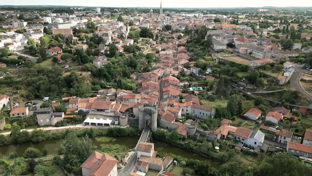 Circular Dolly Panoramic Aerial View of Medieval French Town With Green River on a Hill