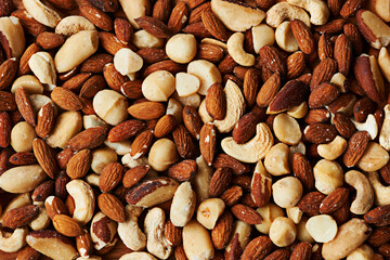 Nuts, mix and organic snack for health, selection and variety of options for fat and minerals. Closeup, nutrition and textures of vitamins or antioxidants, wellness and cashew or almonds for energy