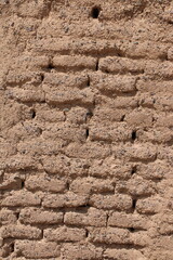 Uncover the raw beauty of decay with texture-rich photography, showcasing the haunting elegance of an abandoned clay house