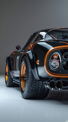 A classic black and orange sports car - obrazy, fototapety, plakaty