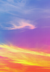 Fototapeta premium Sky midday sunlight beams rainbow pastel gradient pale orange-pink purple-blue dramatic. Beautiful sunny day soft light clouds blur background.