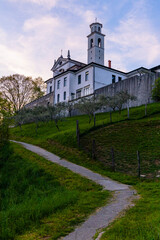 Gorizia Castle seen from the top of the hill over Nova-Gorica in Slovenia. Quiet day, relaxing places in the greenery, panorama with sunset and warm-colored clouds. Cultural Heritage Capital 2025.