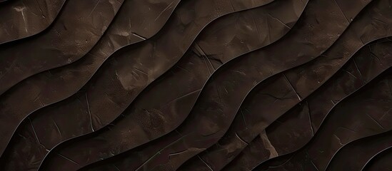 A close up of a brown leather texture resembling waves, reminiscent of the formation of hardwood flooring. The tints and shades mimic the natural patterns found in tree bark and soil - obrazy, fototapety, plakaty