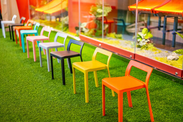 Background of chairs waiting for tables outside the restaurant in Guangzhou Food City